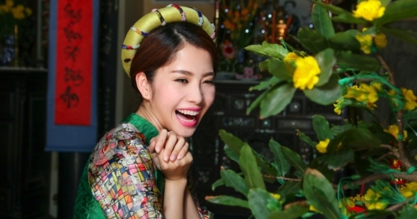 Hoa khôi Nam Em lấn sân ca hát với MV Tết sang