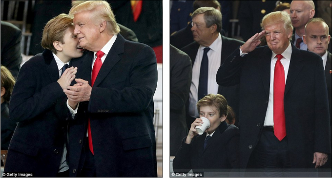Barron Trump - cậu con trai 10 tuổi chia sẻ một gi&acirc;y ph&uacute;t ri&ecirc;ng tư với cha của m&igrave;nh. Hai cha con uống chung một ly nước ấm khi đo&agrave;n diễu h&agrave;nh tới Nh&agrave; Trắng. (Ảnh: Getty Images)