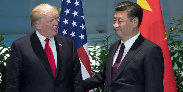 Tổng thống Donald Trump (tr&aacute;i) v&agrave; Chủ tịch Trung Quốc Tập Cận B&igrave;nh (Ảnh: Reuters)