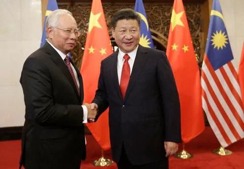 Thủ tướng Malaysia Najib Razak gặp Chủ tịch Trung Quốc Tập Cận B&igrave;nh hồi năm 2016. (Nguồn: Jason Lee / AFP / Getty Images)