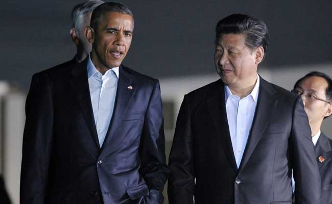 Tổng thống Mỹ Barack Obama (tr&aacute;i) v&agrave; Chủ tịch Trung Quốc Tập Cận B&igrave;nh. (Ảnh: AFP)