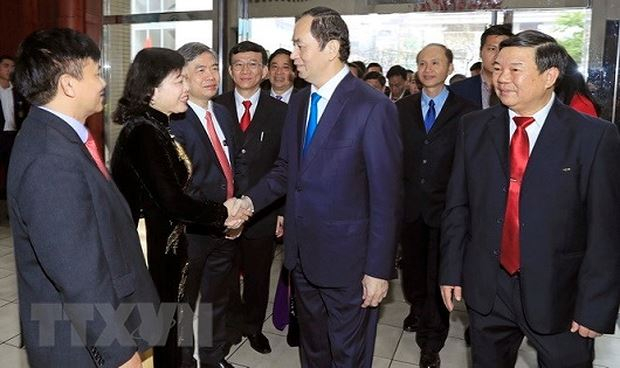Chủ tịch nước Trần Đại Quang với c&aacute;c đại biểu tham dự Lễ kỷ niệm.