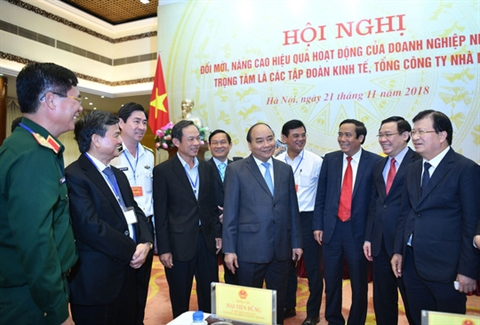 Thủ tướng Nguyễn Xu&acirc;n Ph&uacute;c trong một buổi hội nghị về hoạt động của c&aacute;c doanh nghiệp nh&agrave; nước.