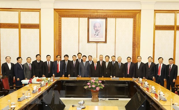 Tổng Bí thư, Chủ tịch nước Nguyễn Phú Trọng và các đại biểu dự buổi lễ. (Ảnh: Trí Dũng/TTXVN)