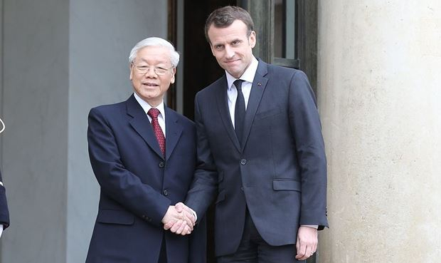 Tổng B&iacute; thư Nguyễn Ph&uacute; Trọng v&agrave; Tổng thống Ph&aacute;p Emmanuel Macron. Ảnh: TTXVN