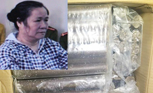Đối tượng Nguyễn Thị Loan c&ugrave;ng gần 3 tạ thuốc nổ l&uacute;c bị bắt giữ.