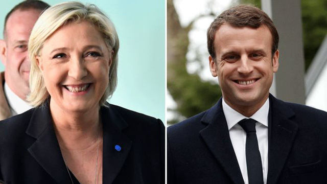 Ứng vi&ecirc;n Marine Le Pen (tr&aacute;i) v&agrave; ứng vi&ecirc;n Emmanuel Macron. (Ảnh: AFP)
