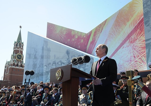 Tổng thống Nga Vladimir Putin tuy&ecirc;n bố một ph&uacute;t mặc niệm tại sự kiện.