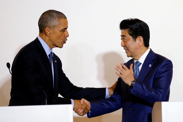 Tổng thống Mỹ Barack Obama v&agrave; Thủ tướng Nhật Bản Shinzo Abe (Ảnh: Reuters).