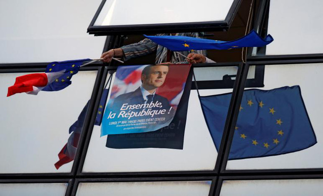 &Ocirc;ng Macron trở th&agrave;nh tổng thống sẽ chủ trương hội nhập EU thay v&igrave; quan điểm r&uacute;t khỏi EU như của đối thủ đảng Mặt trận Quốc gia Marine Le Pen. (Ảnh: Reuters)