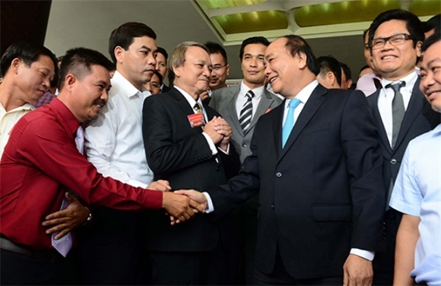 Thủ tướng Nguyễn Xu&acirc;n Ph&uacute;c trong cuộc gặp doanh nghiệp năm 2016   Ảnh: Theo VietNamFinance&nbsp;