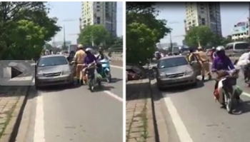 Clip: CSGT bất ngờ khống chế tài xế giữa phố Hà Nội