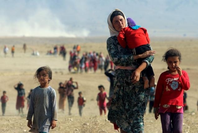 Từ l&uacute;c chiếm được thị trấn Sinjar, t&acirc;y bắc Iraq IS đ&atilde; thảm s&aacute;t &iacute;t nhất 500 người Yazidi. Một số nạn nh&acirc;n đ&atilde; bị ch&ocirc;n sống. (Ảnh: Reuters)