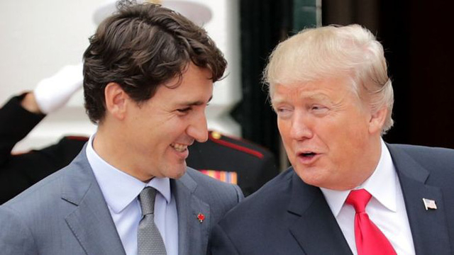 Tổng thống Mỹ Donald Trump v&agrave; Thủ tướng Canada Justin Trudeau (Ảnh: Getty)