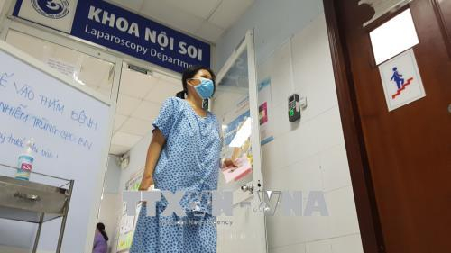 Người mắc c&uacute;m A (H1N1) tại Bệnh viện Từ Dũ, TP. Hồ Ch&iacute; Minh. Ảnh: TTXVN