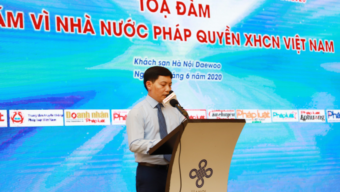 Phó Bí thư Đảng ủy, Phó Tổng biên tập Báo Pháp luật Việt Nam Trần Đức Vinh khai mạc chương trình Tọa đàm