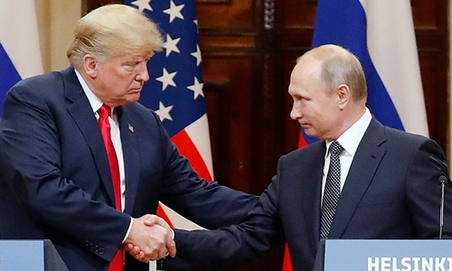 Tổng thống Mỹ Donald Trump v&agrave; Tổng thống Nga Putin. (Ảnh: AFP)