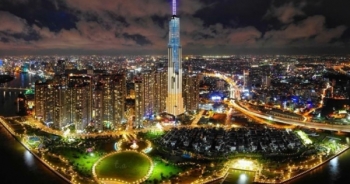 Slide - địa ốc: Tòa nhà cao nhất Việt Nam lung linh về đêm giữa Sài Gòn