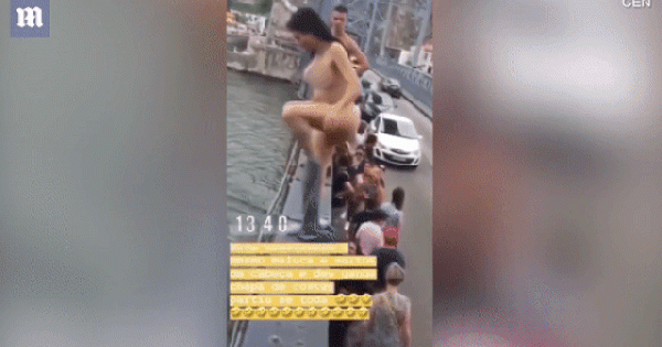 Clip nóng: Nữ du khách khỏa thân, liều lĩnh nhảy cầu từ độ cao 45m