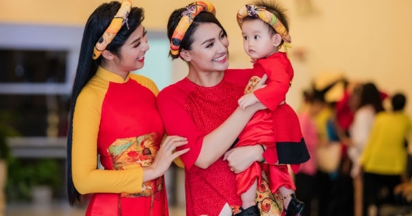 Hồng Quế bế con gái diễn áo dài cho Hoa hậu Ngọc Hân