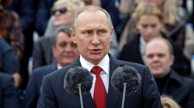 Putin k&ecirc;u gọi người d&acirc;n tham gia bầu cử. (Ảnh: Reuters)