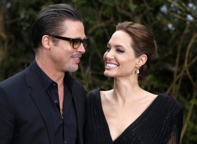 Brad Pitt v&agrave; Angelina Jolie tham gia lễ ra mắt bộ phim&nbsp;Maleficent ở London năm 2014. (Ảnh: Reuters)