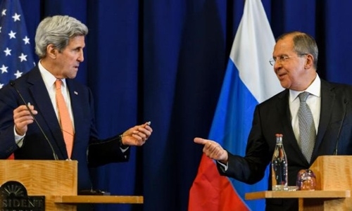 Ngoại trưởng Mỹ John Kerry (tr&aacute;i) v&agrave; người đồng cấp Nga Sergei Lavrov trong một cuộc họp b&aacute;o chung ở Geneva. (Ảnh: AFP.)