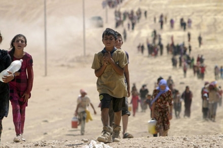 Gần 2 triệu trẻ em Syria phải đi tị nạn do chiến tranh. (Ảnh: AFP)