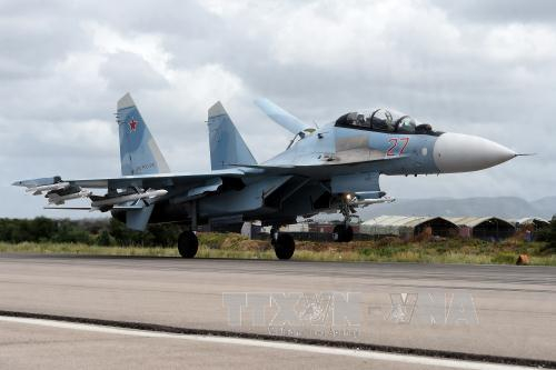M&aacute;y bay n&eacute;m bom Sukhoi Su-35 của Nga tại căn cứ qu&acirc;n sự ở tỉnh Latakia, Syria ng&agrave;y 4/5/2016. Ảnh: AFP/TTXVN