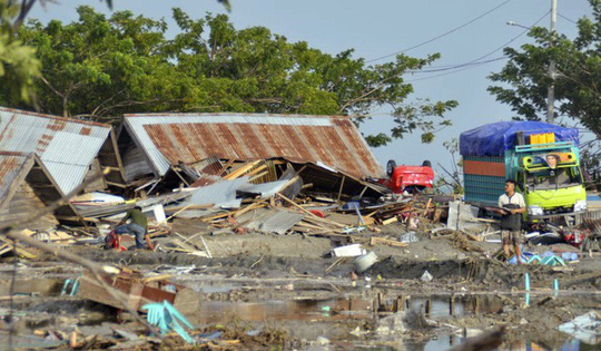 Những thiệt hại do s&oacute;ng thần g&acirc;y ra ở Palu - Ảnh: AP