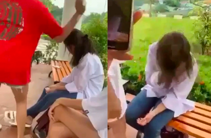 Nữ sinh bị đánh hội đồng dã man sau lễ khai giảng tại Công viên Đồng Tâm, TP Yên Bái (Ảnh:  cắt từ clip).
