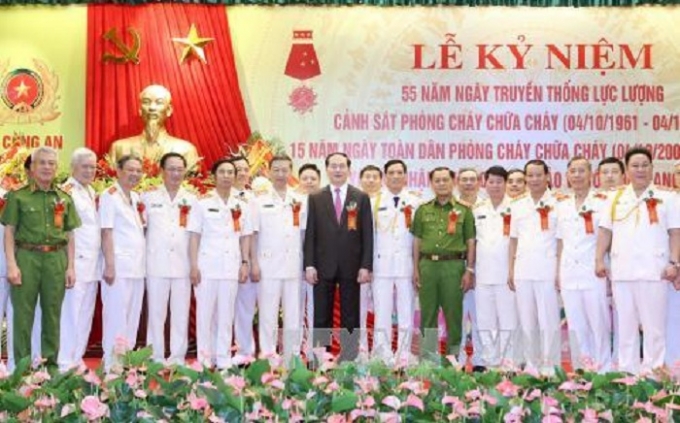 Chủ tịch nước Trần Đại Quang với c&aacute;c đại biểu tại Lễ kỷ niệm. Ảnh: Nhan S&aacute;ng/TTXVN.