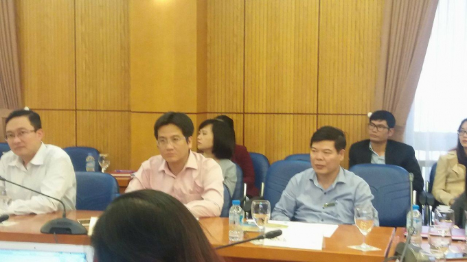 TS Trần Quang Huy (ngồi b&agrave;n đầu b&ecirc;n phải) tại buổi họp b&aacute;o, Bộ Tư ph&aacute;p.