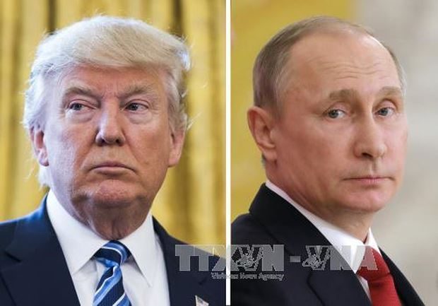 Tổng thống Mỹ Donald Trump (tr&aacute;i) v&agrave; Tổng thống Nga Vladimir Putin. Ảnh: EPA/TTXVN
