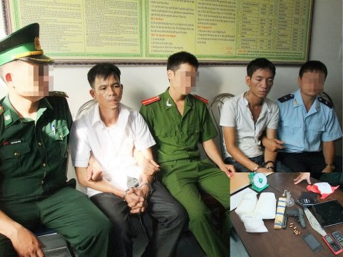 Nguyễn C&ocirc;ng Cường v&agrave; Phạm Kim Dũng l&uacute;c bị bắt giữ.