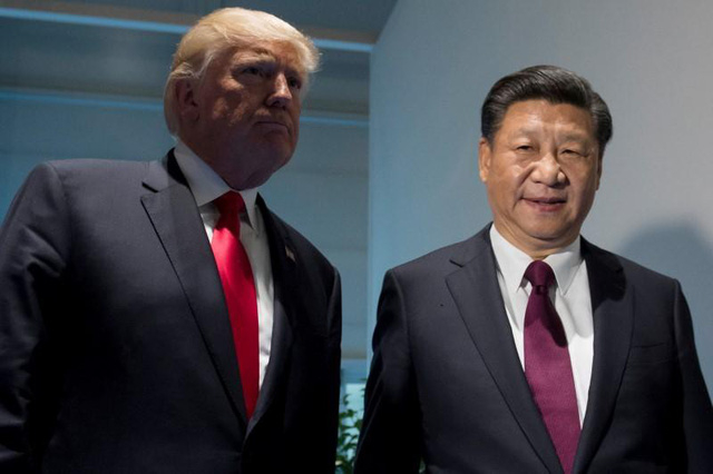 Tổng thống Mỹ Donald Trump v&agrave; Chủ tịch Trung Quốc Tập Cận B&igrave;nh gặp mặt b&ecirc;n lề hội nghị G-20 ở Đức hồi th&aacute;ng 7/2017. (Ảnh: Reuters)