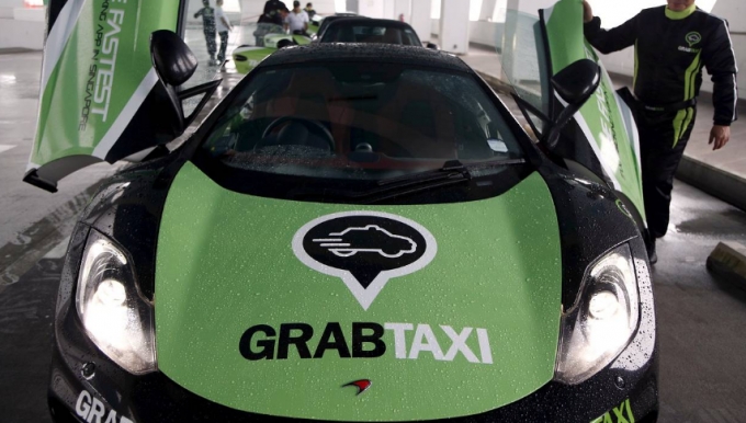 Tại sao Honda đầu tư v&agrave;o GrabTaxi thay v&igrave; Uber?