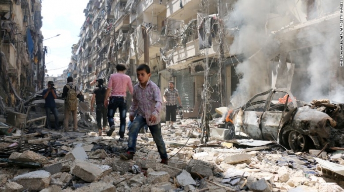 Khung cảnh hoang t&agrave;n, đổ n&aacute;t tại v&ugrave;ng chiến sự Aleppo, Syria (Ảnh:&nbsp;CNN)