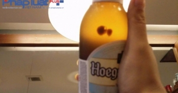 Khách hàng tố Mega Market Thăng Long bán bia Hoegaarden có vẩn đục