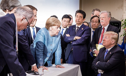 Trump v&agrave; c&aacute;c l&atilde;nh đạo thế giới tại hội nghị G7. Ảnh:&nbsp;AFP.