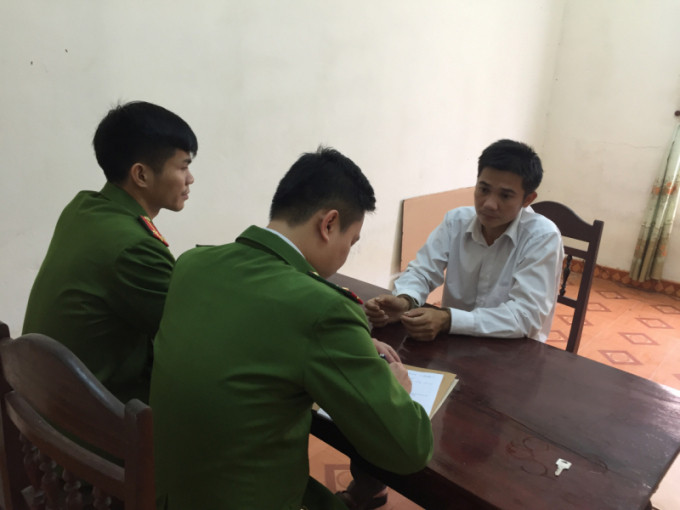 Đối tượng Nguyễn Văn Quang tại cơ quan điều tra (Ảnh: CAQB)
